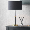 Bryce Black and Gold Metal Rise and Fall Table Lamp