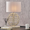 Orla Shiny Gold Metal Statement Circle Table Lamp Base with Mia 35cm Ivory Oval Poly Cotton Lampshade