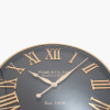 Antique Gold and Black Metal Wall Clock