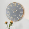 Antique Gold and Black Metal Wall Clock